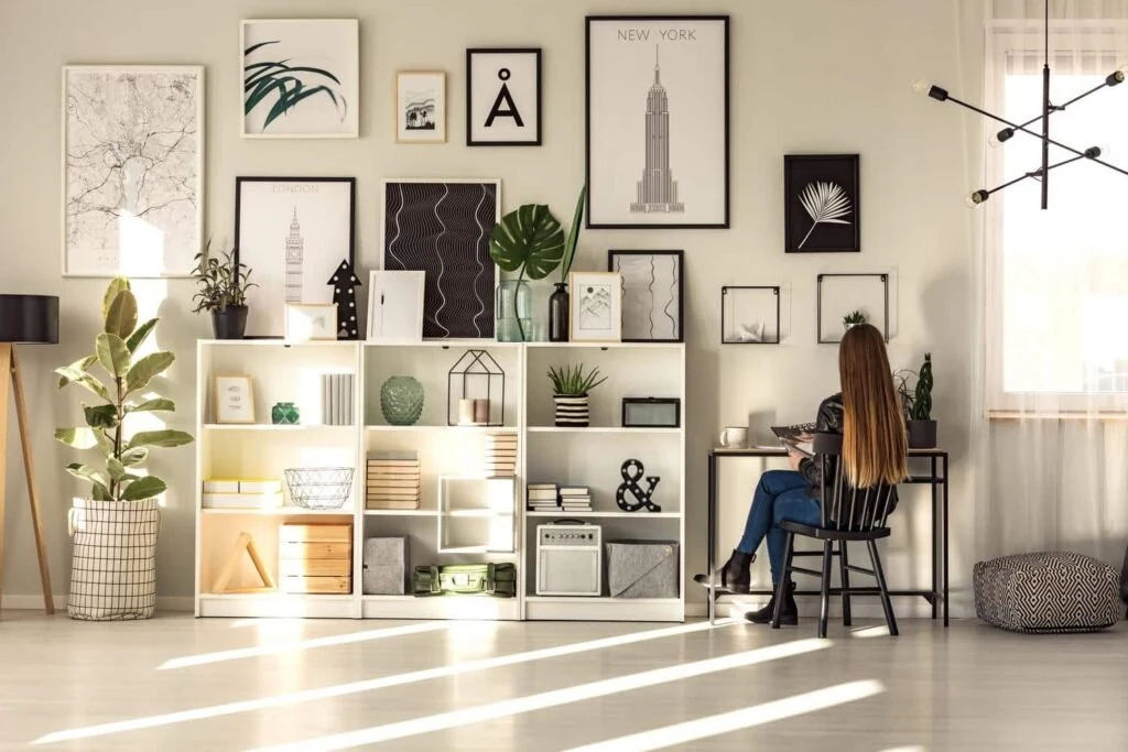Home office with a desk and wall-mounted storage shelves