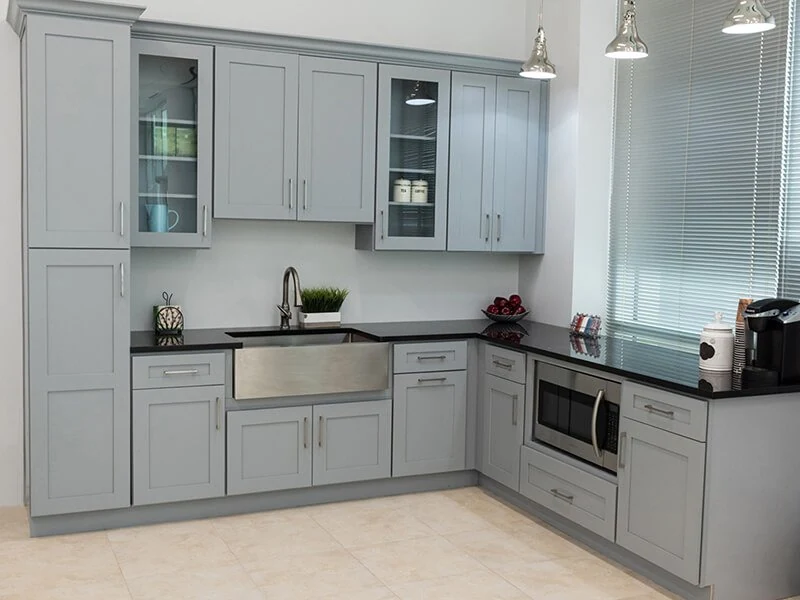 Light kitchen cabinets with glass-front upper storage