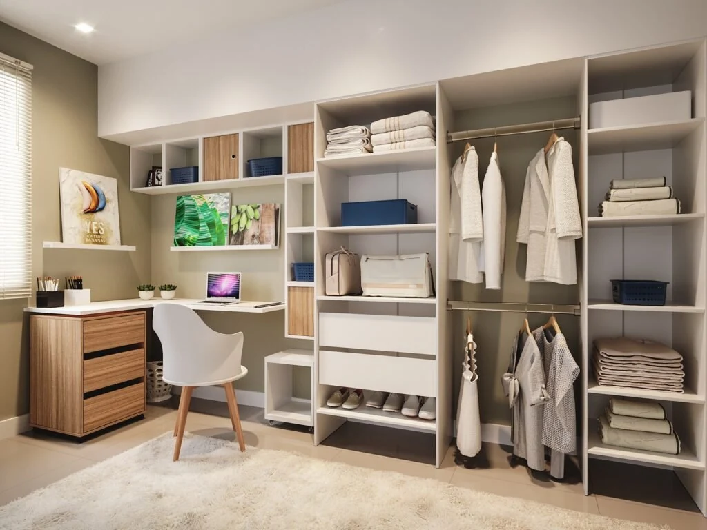 Home office combining a desk, shelves, and wardrobe storage