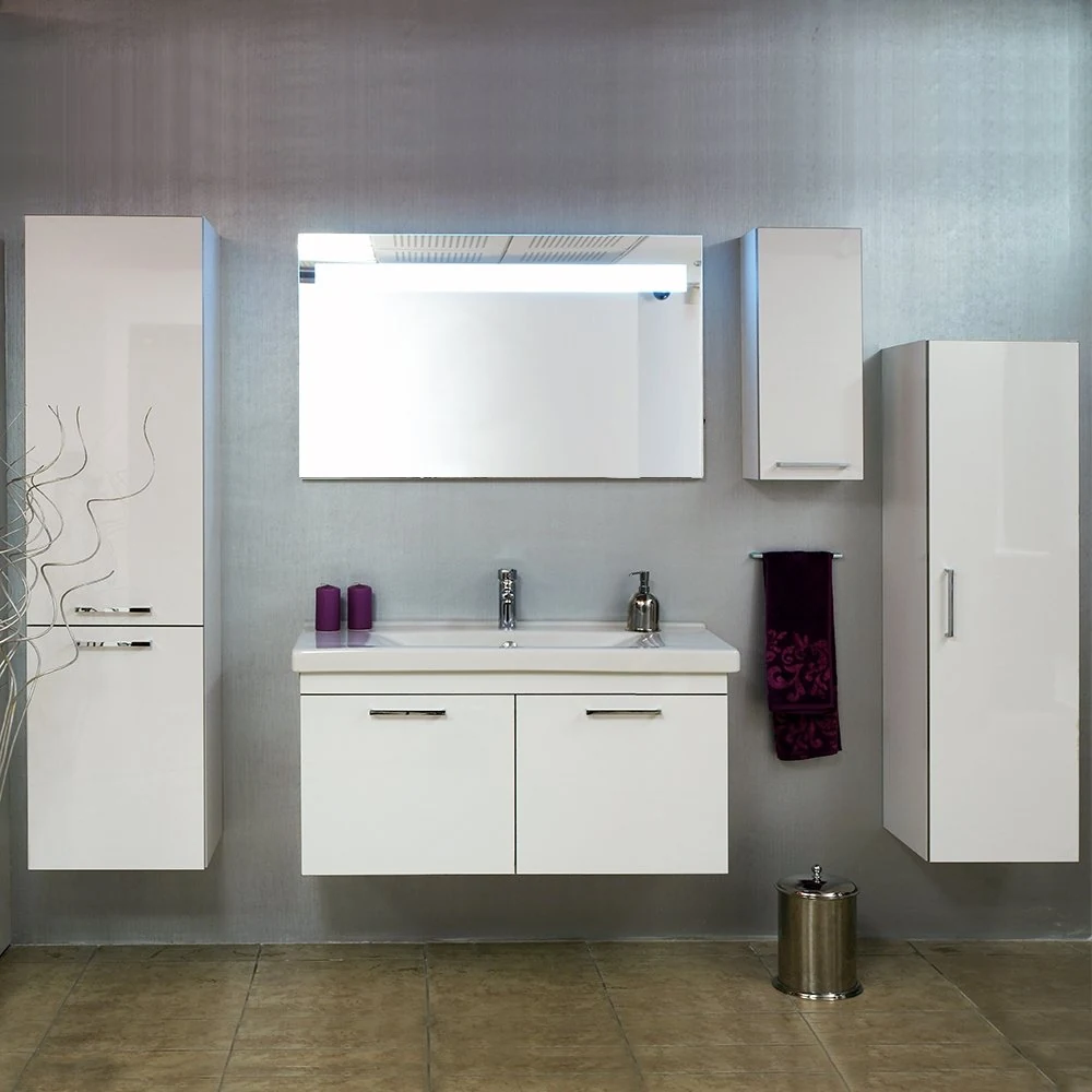 Bathroom with white floating cabinets and a mirrored storage unit